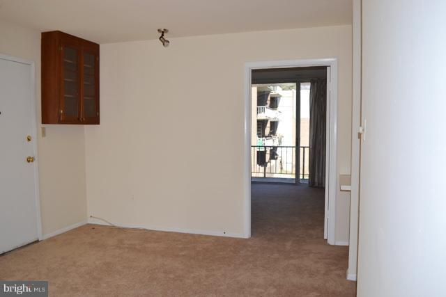 3940 Bel Pre Road, Unit 4 Silver Spring, MD 20906 - Photo 2 of 11 Living Room to bedroom