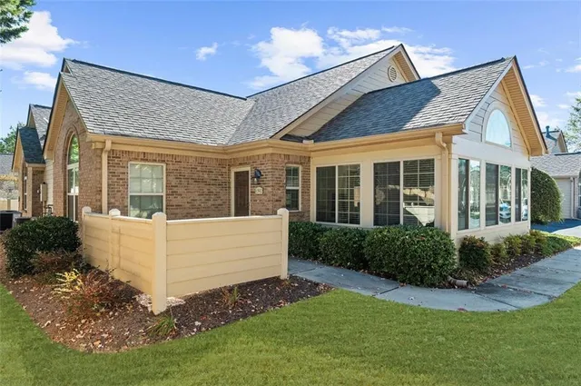 a view of house with backyard porch and entertaining space