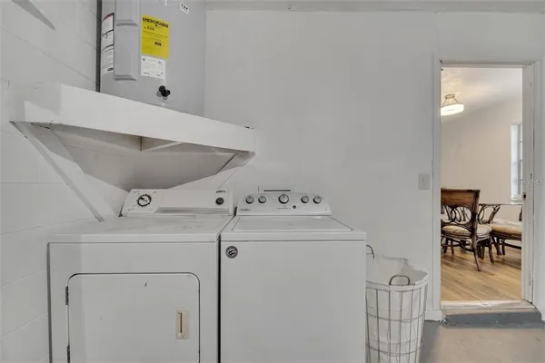 a utility room with dryer and washer