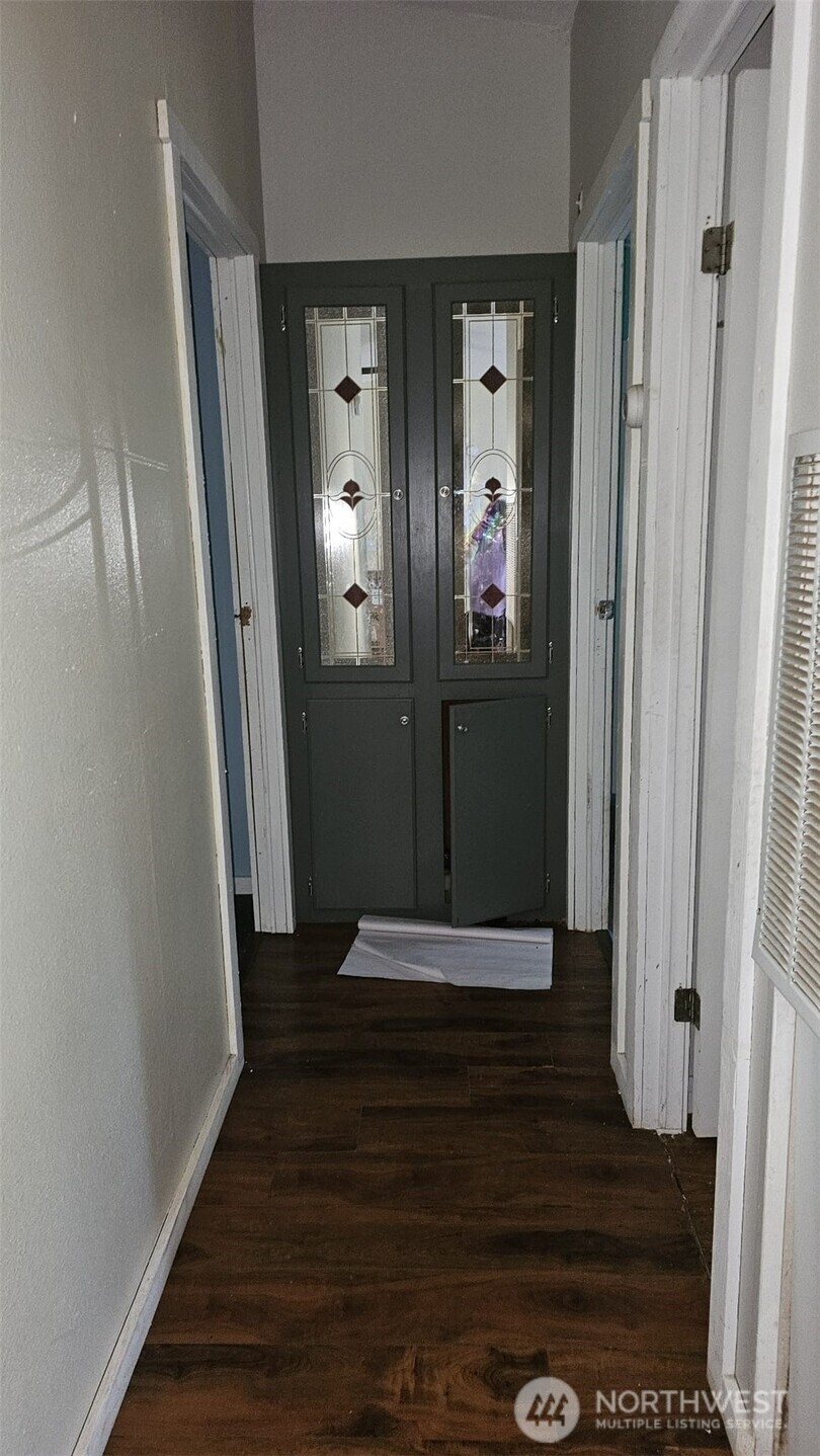 1104 East Alderwood Road Belfair, WA 98528 - Photo 3 of 15 a view of an entryway door