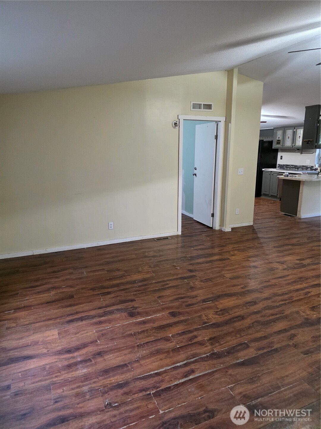 1104 East Alderwood Road Belfair, WA 98528 - Photo 4 of 15 a view of a kitchen with wooden floor
