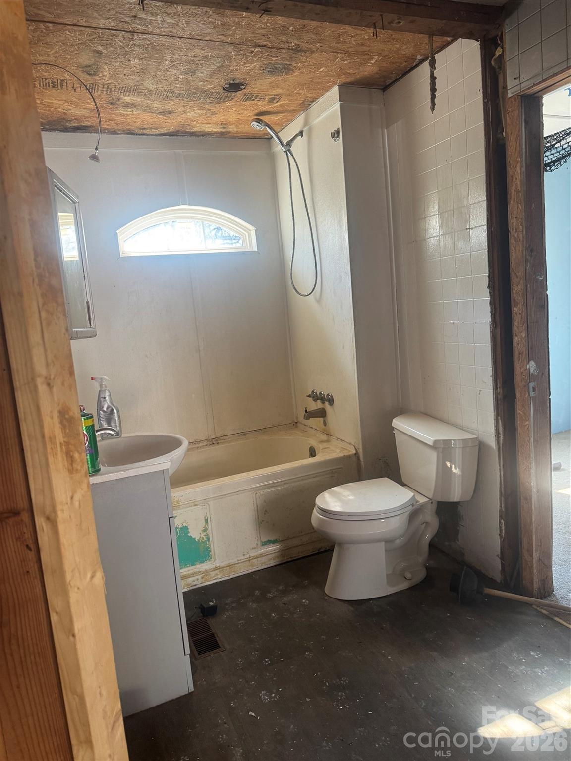 178 Newline Road Mooresboro, NC 28114 - Photo 5 of 9 a white toilet sitting next to a bathtub