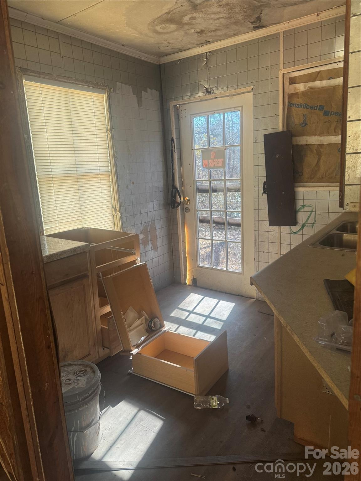 178 Newline Road Mooresboro, NC 28114 - Photo 9 of 9 a bed sitting in a bedroom next to a window