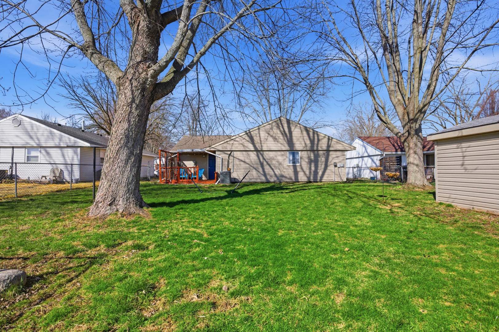 1412 South 2nd Street Mattoon, IL 61938 - Photo 17 of 20 a view of a house with a back yard