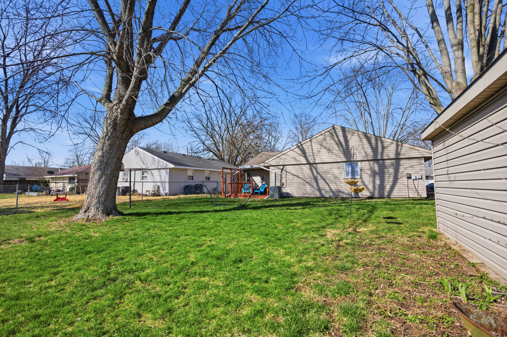 1412 South 2nd Street Mattoon, IL 61938 - Photo 18 of 20 a view of backyard with large trees and a barn