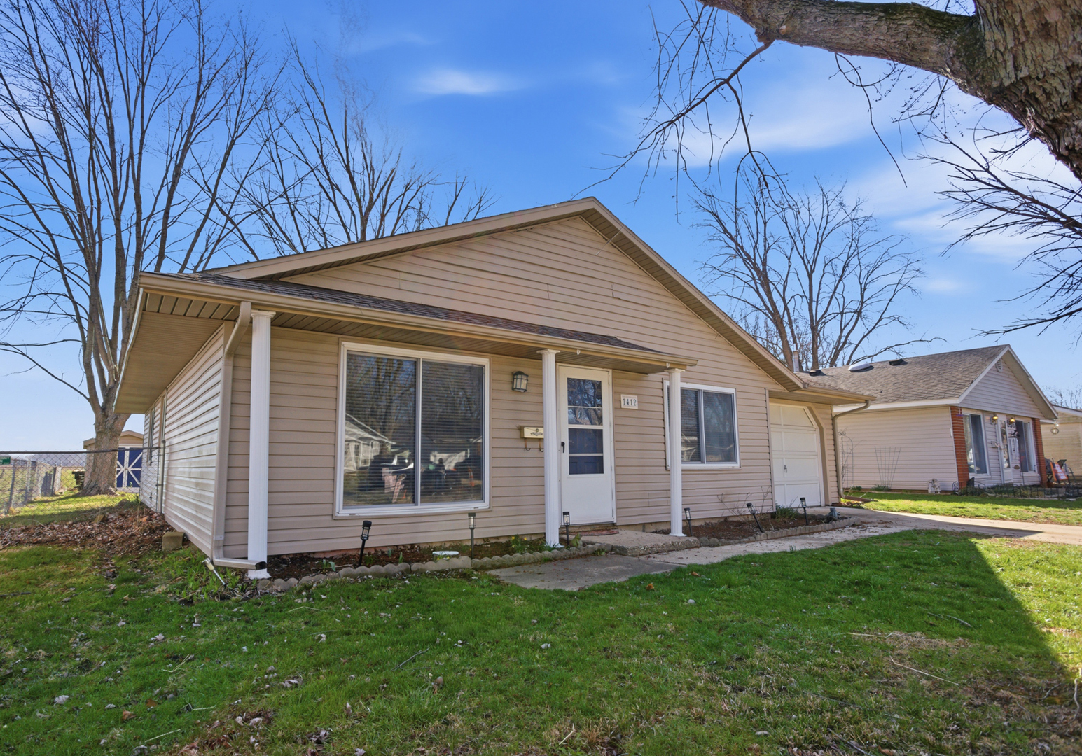 1412 South 2nd Street Mattoon, IL 61938 - Photo 2 of 20 a view of a house with a yard