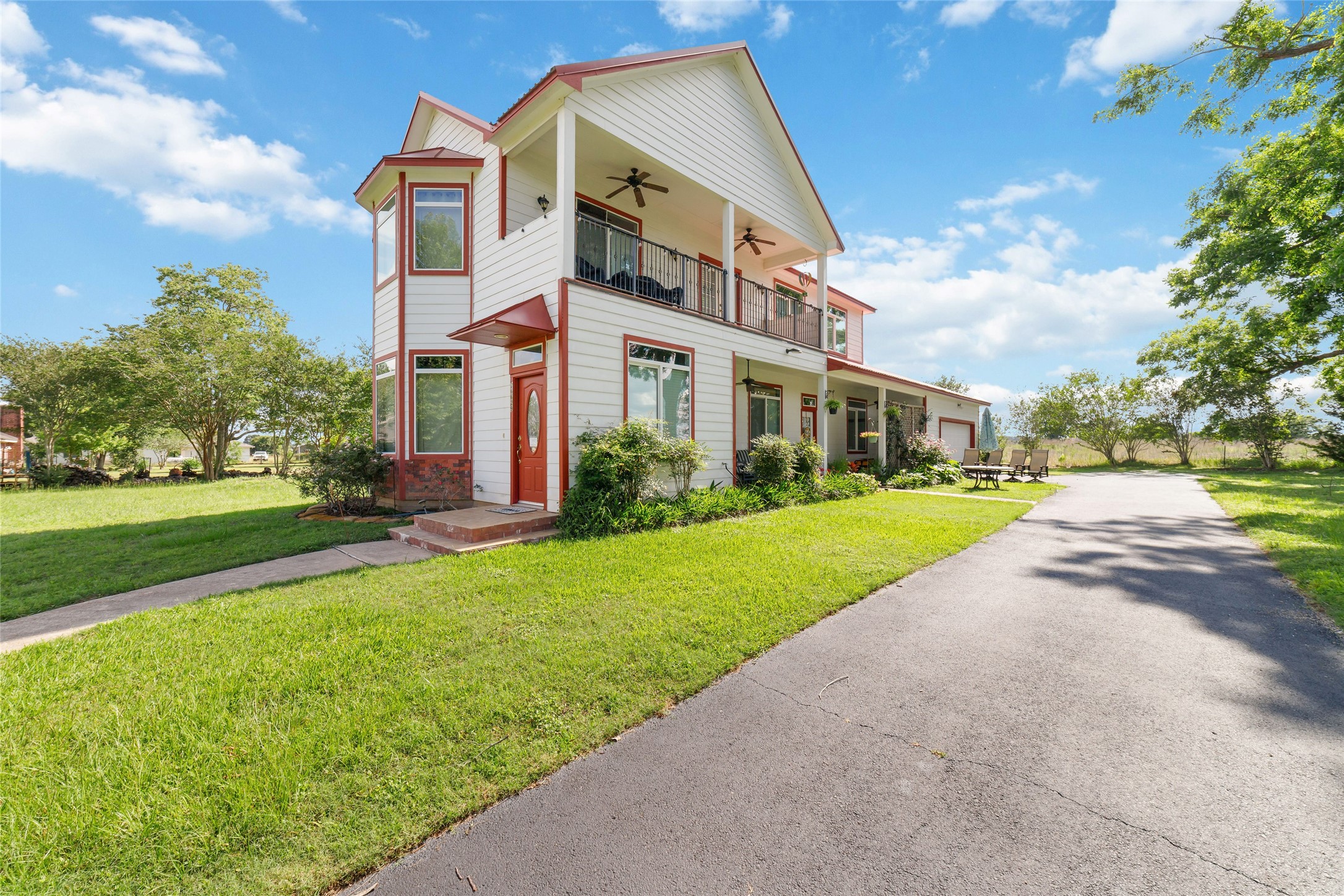 26631 Decker Prairie-Rosehill Road Magnolia, TX 77355 - Photo 7 of 20 a front view of house with yard and green space