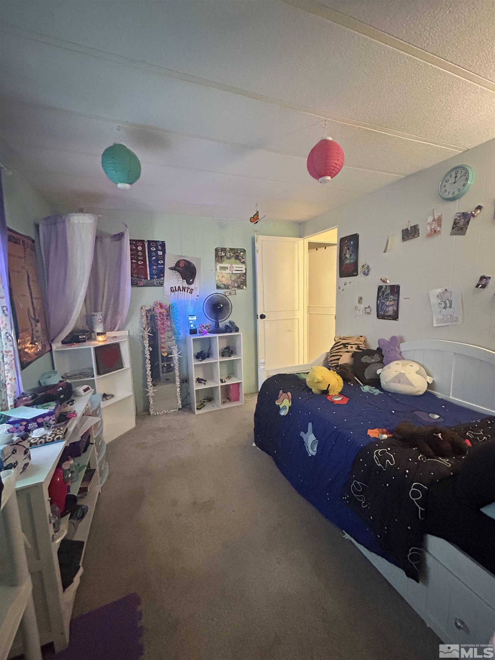 212 Coons Circle, Unit E Dayton, NV 89403 - Photo 12 of 20 a living room with furniture and a window