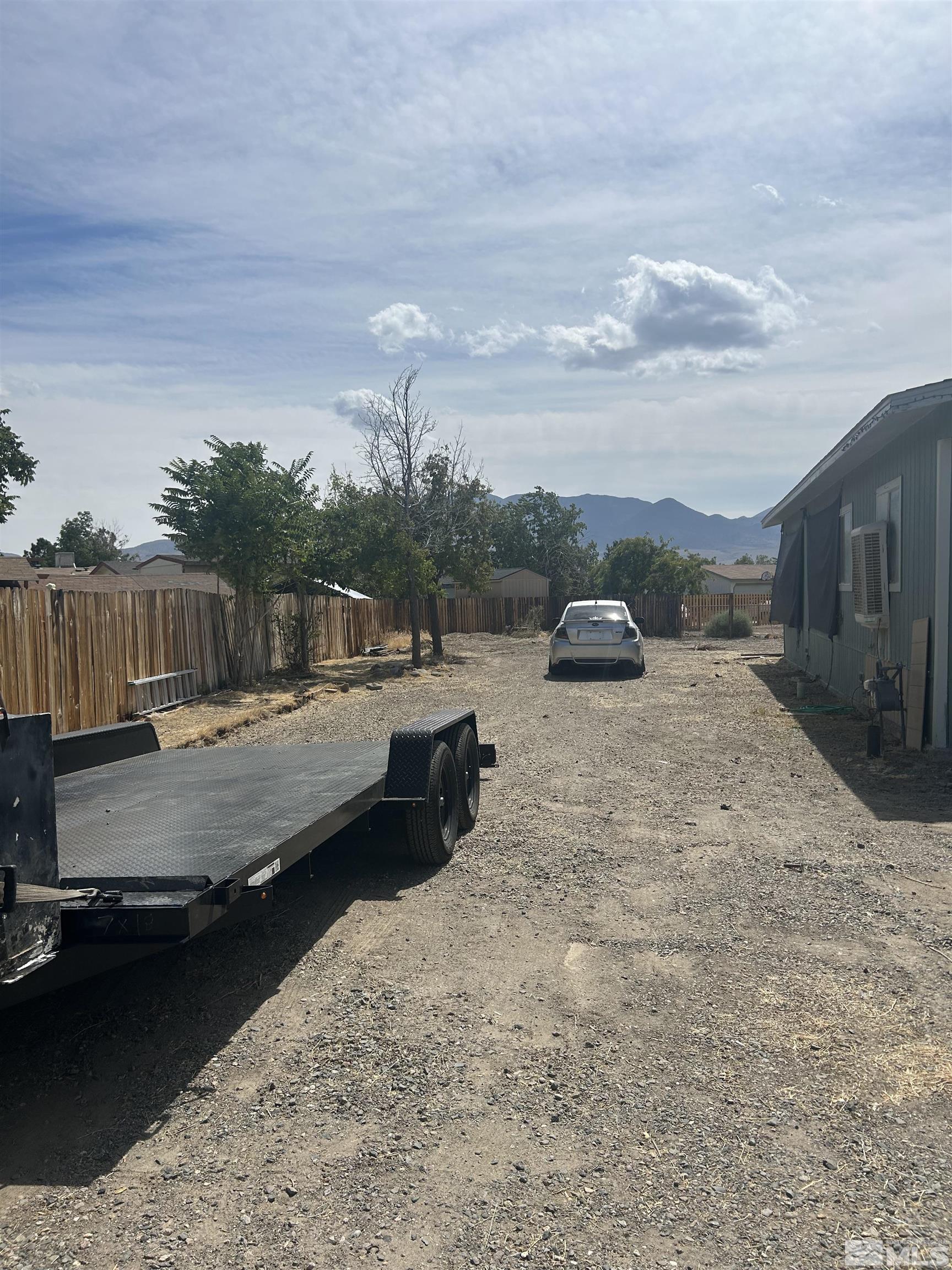 212 Coons Circle, Unit E Dayton, NV 89403 - Photo 16 of 20 a view of a terrace with a barbeque