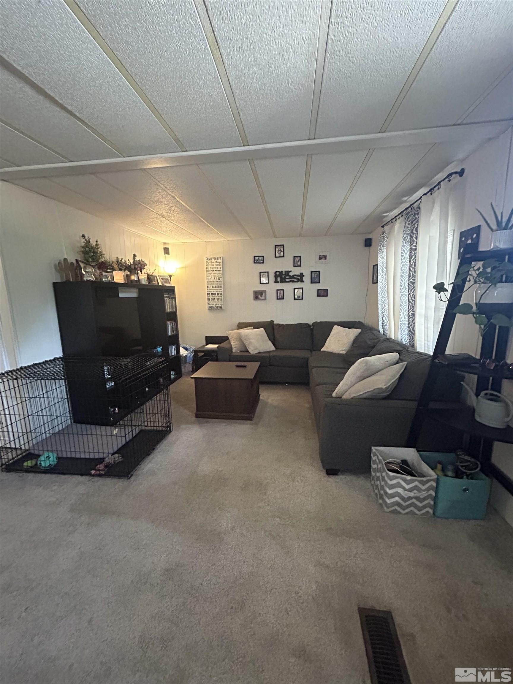 212 Coons Circle, Unit E Dayton, NV 89403 - Photo 3 of 20 a living room with furniture