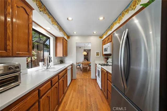 a spacious bedroom with a bed and a large window