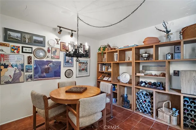 a spacious bathroom with a granite countertop tub sink and mirror