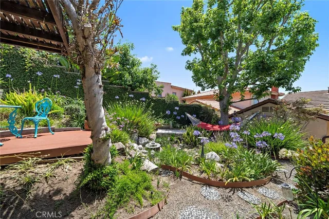 an aerial view of a house with roof deck