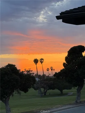 a living room with fireplace furniture and a flat screen tv