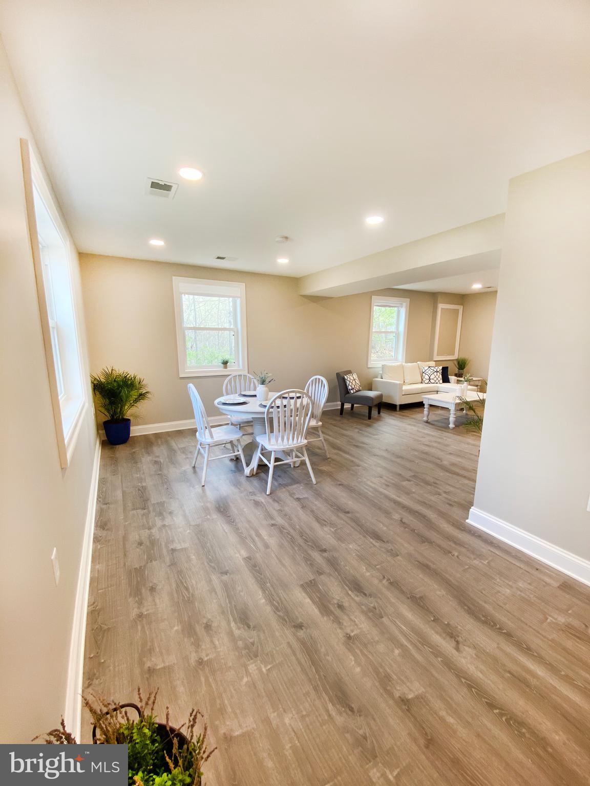 3797 Howellsville Road Front Royal, VA 22630 - Photo 12 of 66 a living room with furniture and a wooden floor