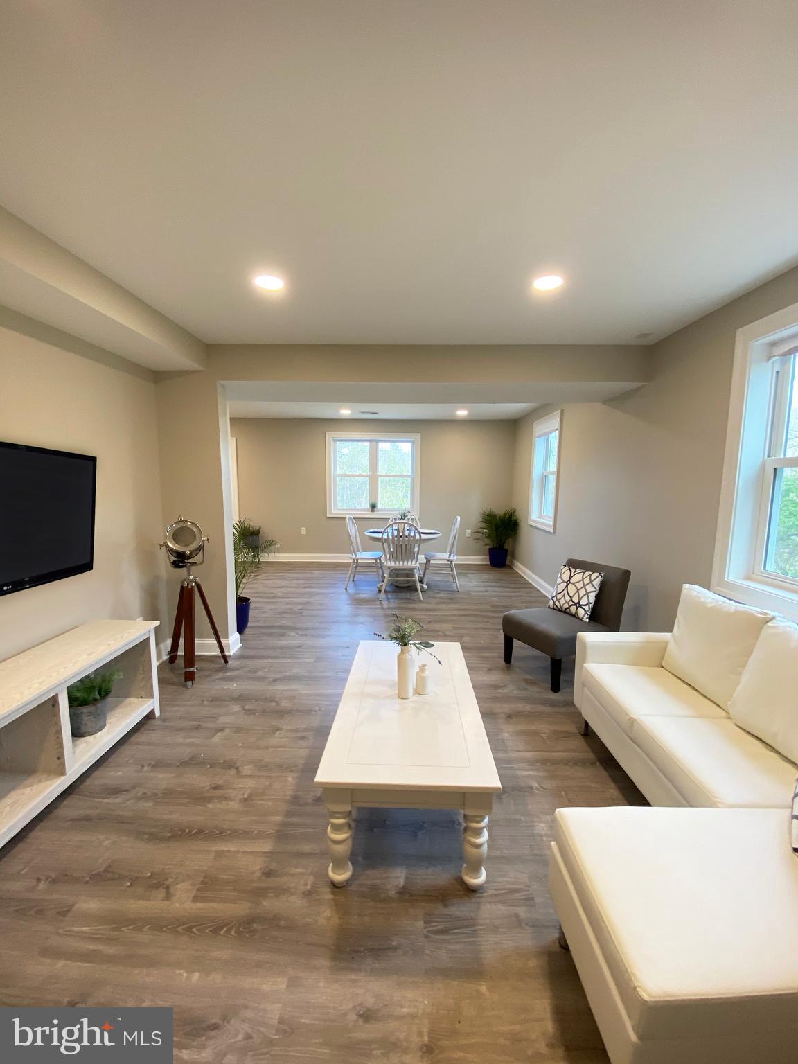 3797 Howellsville Road Front Royal, VA 22630 - Photo 18 of 66 a living room with furniture and a flat screen tv