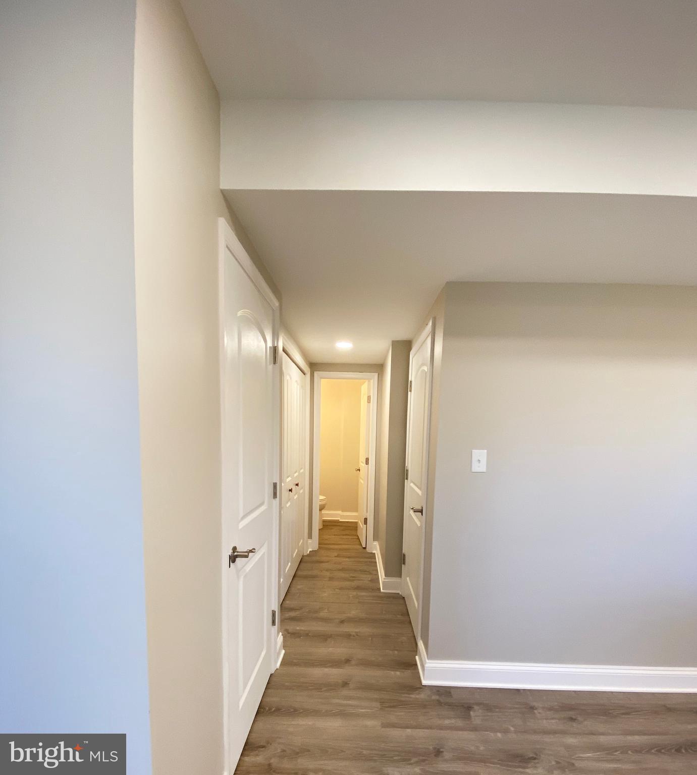 3797 Howellsville Road Front Royal, VA 22630 - Photo 25 of 66 a view of a hallway with wooden floor