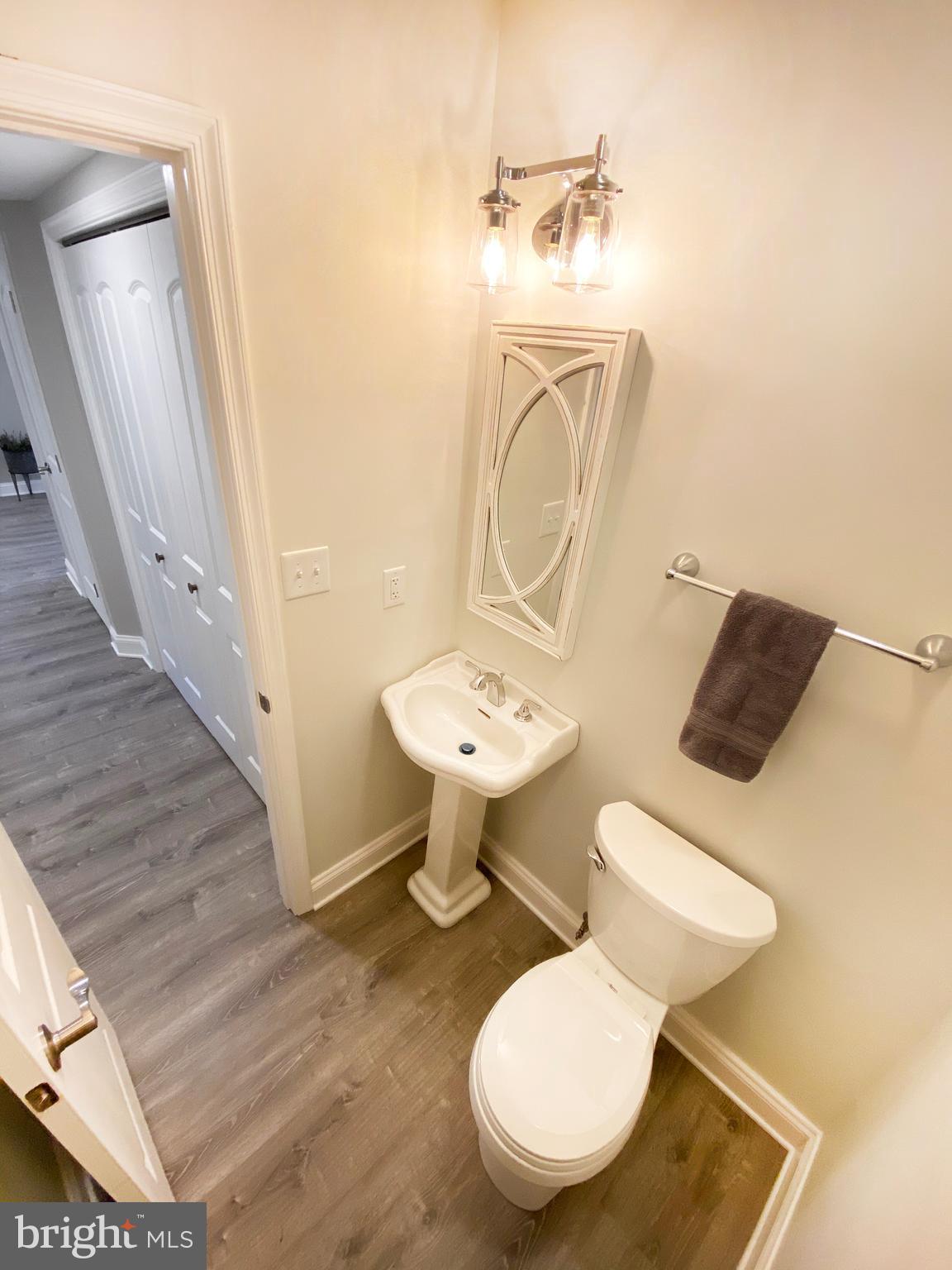 3797 Howellsville Road Front Royal, VA 22630 - Photo 27 of 66 a bathroom with a toilet sink and mirror