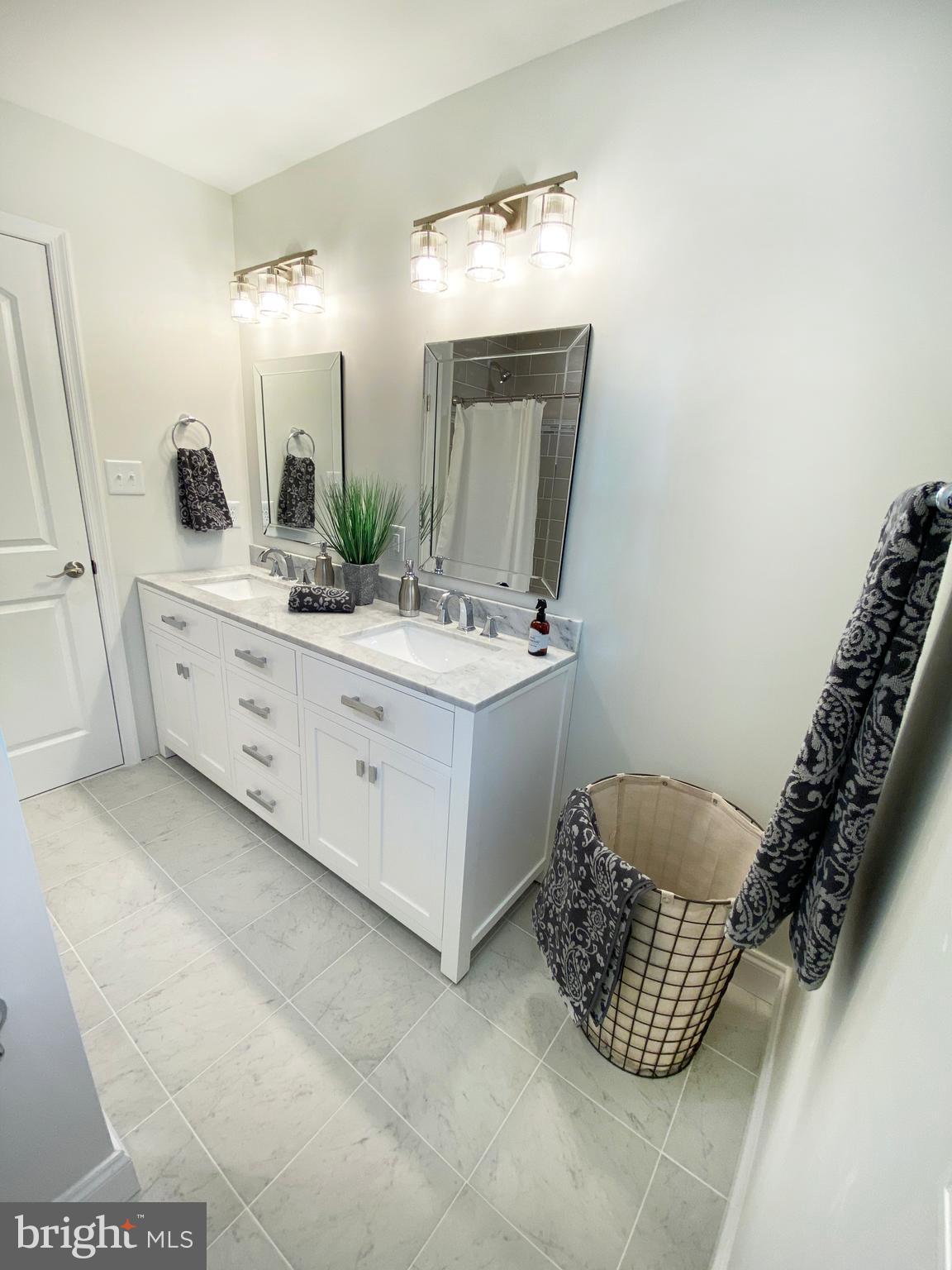 3797 Howellsville Road Front Royal, VA 22630 - Photo 35 of 66 a bathroom with a sink and a mirror