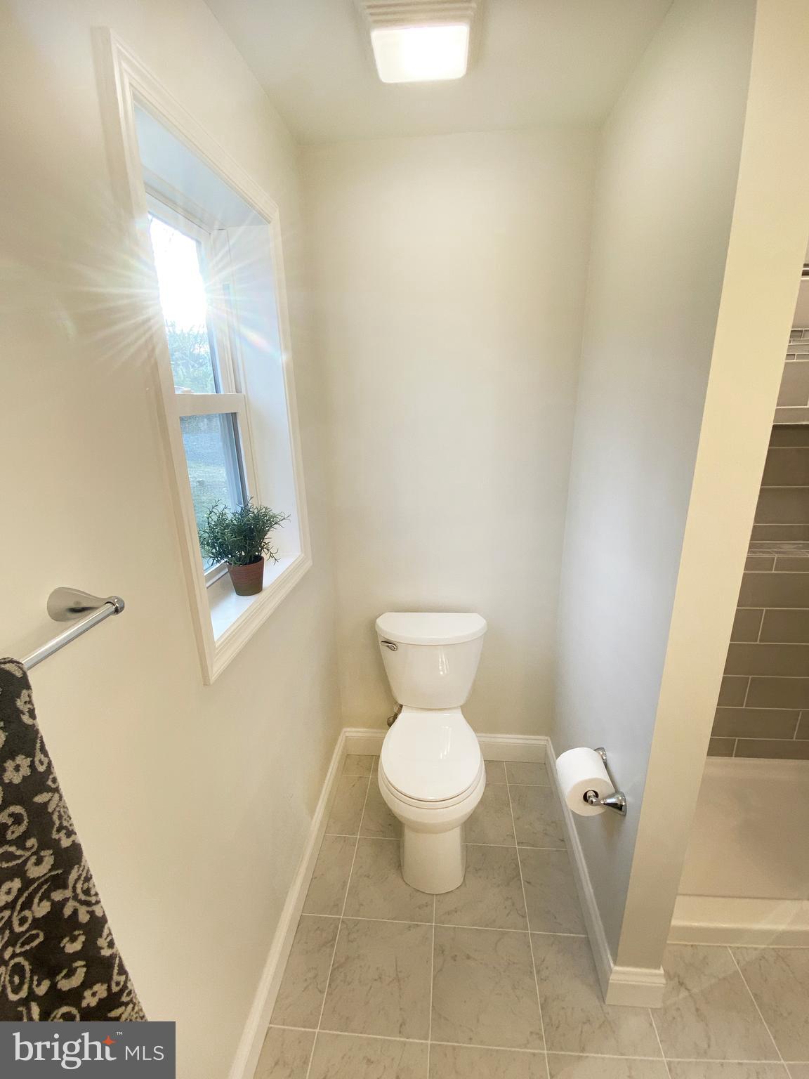 3797 Howellsville Road Front Royal, VA 22630 - Photo 38 of 66 a bathroom with a toilet and a shower