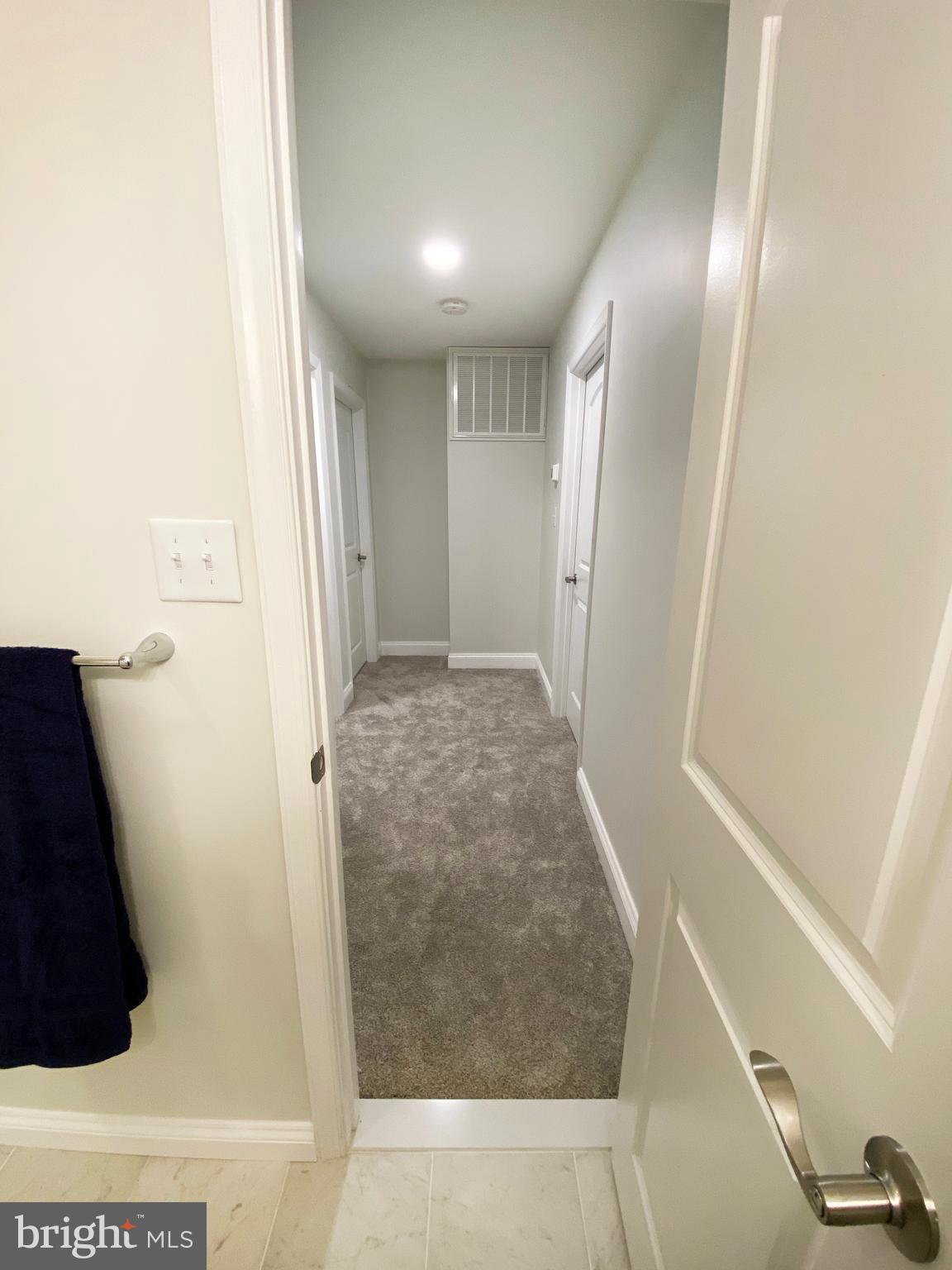 3797 Howellsville Road Front Royal, VA 22630 - Photo 43 of 66 a view of a hallway with wooden floor and staircase
