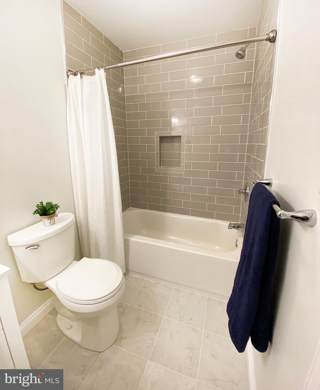 3797 Howellsville Road Front Royal, VA 22630 - Photo 47 of 66 a bathroom with a toilet and a bathtub