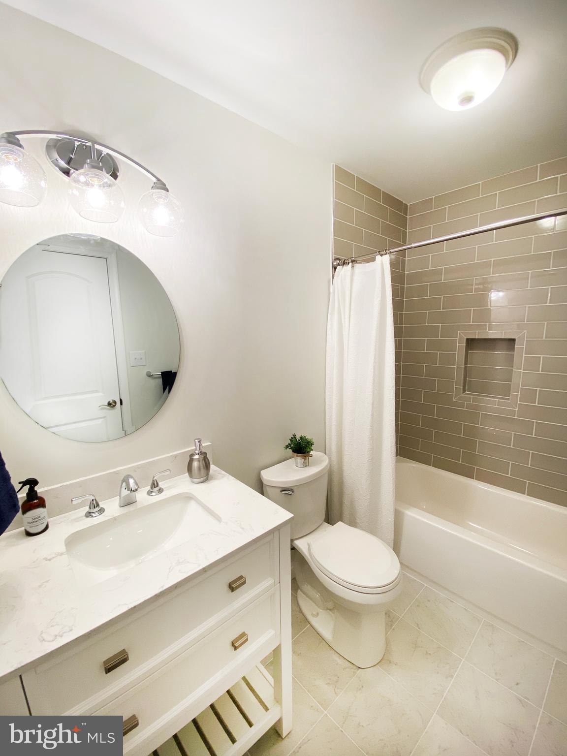 3797 Howellsville Road Front Royal, VA 22630 - Photo 48 of 66 a bathroom with a sink a toilet and shower