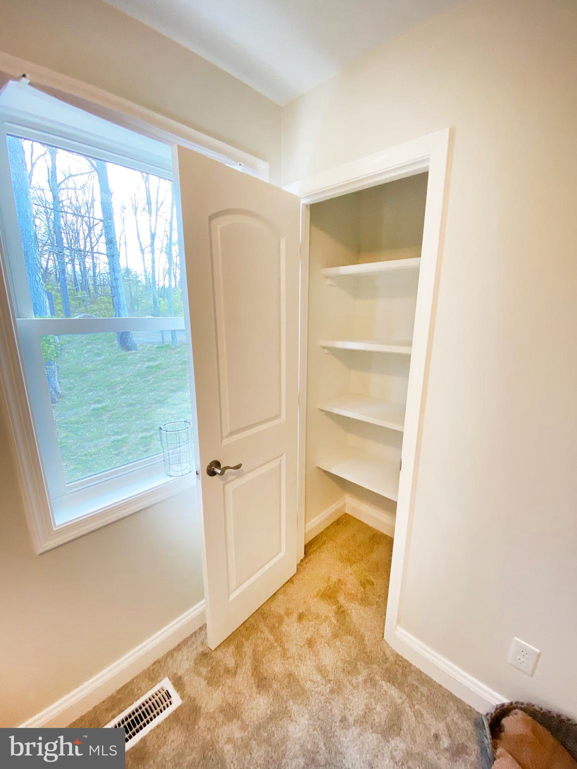 3797 Howellsville Road Front Royal, VA 22630 - Photo 49 of 66 a view of an empty room and window