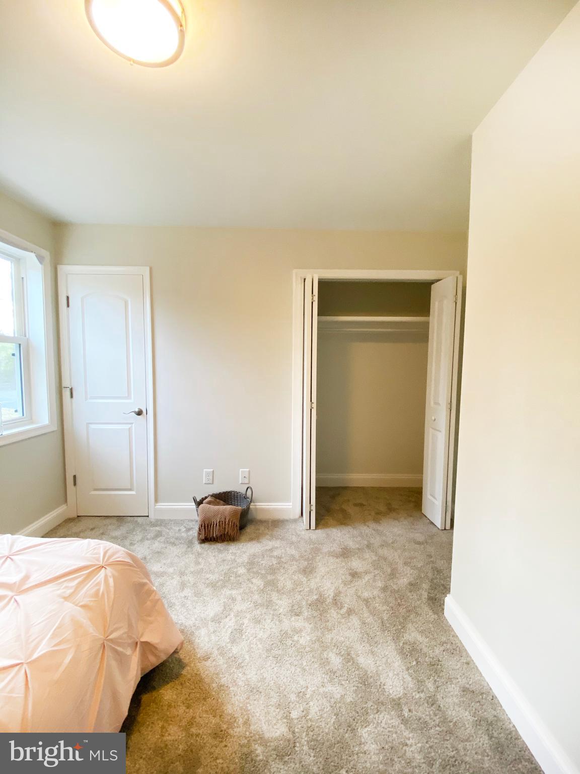 3797 Howellsville Road Front Royal, VA 22630 - Photo 51 of 66 a bedroom with a bed and a window