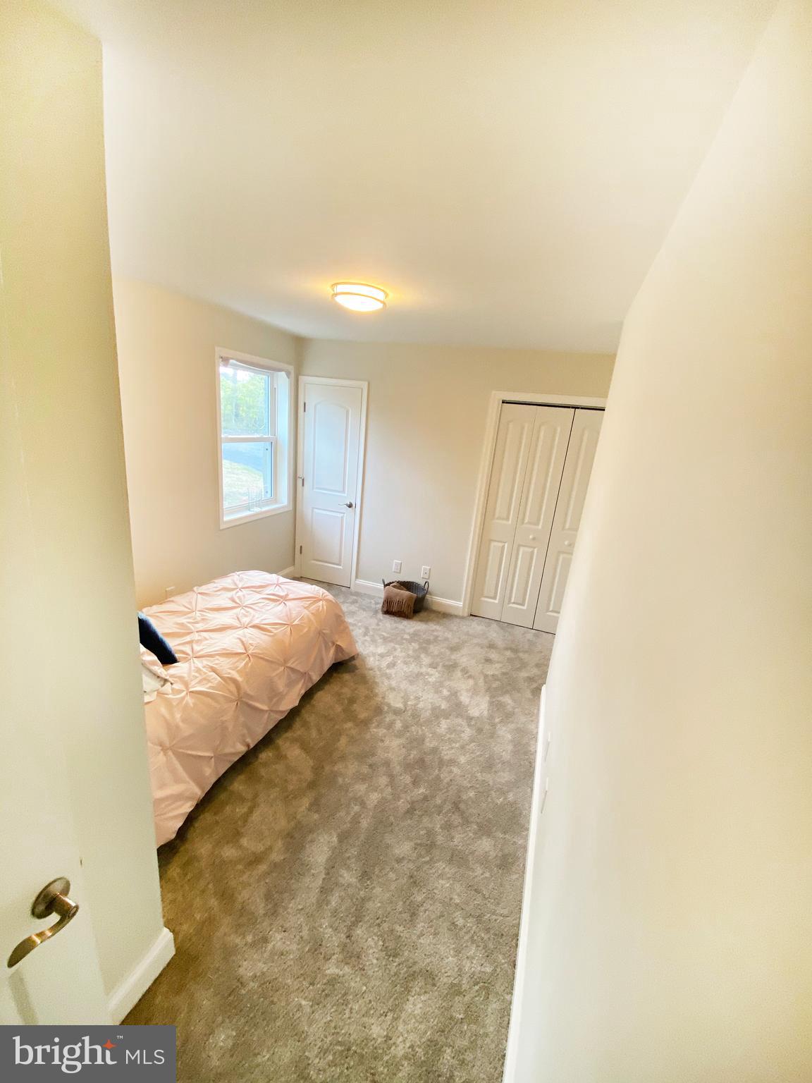 3797 Howellsville Road Front Royal, VA 22630 - Photo 53 of 66 a bedroom with a bed and a dresser