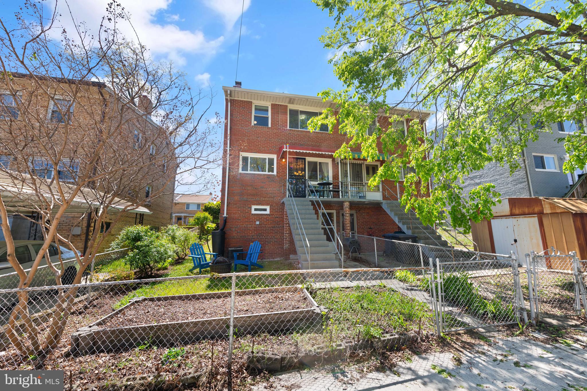 716 Delafield Street Northeast Washington, DC 20017 - Photo 14 of 32 a view of house with a yard