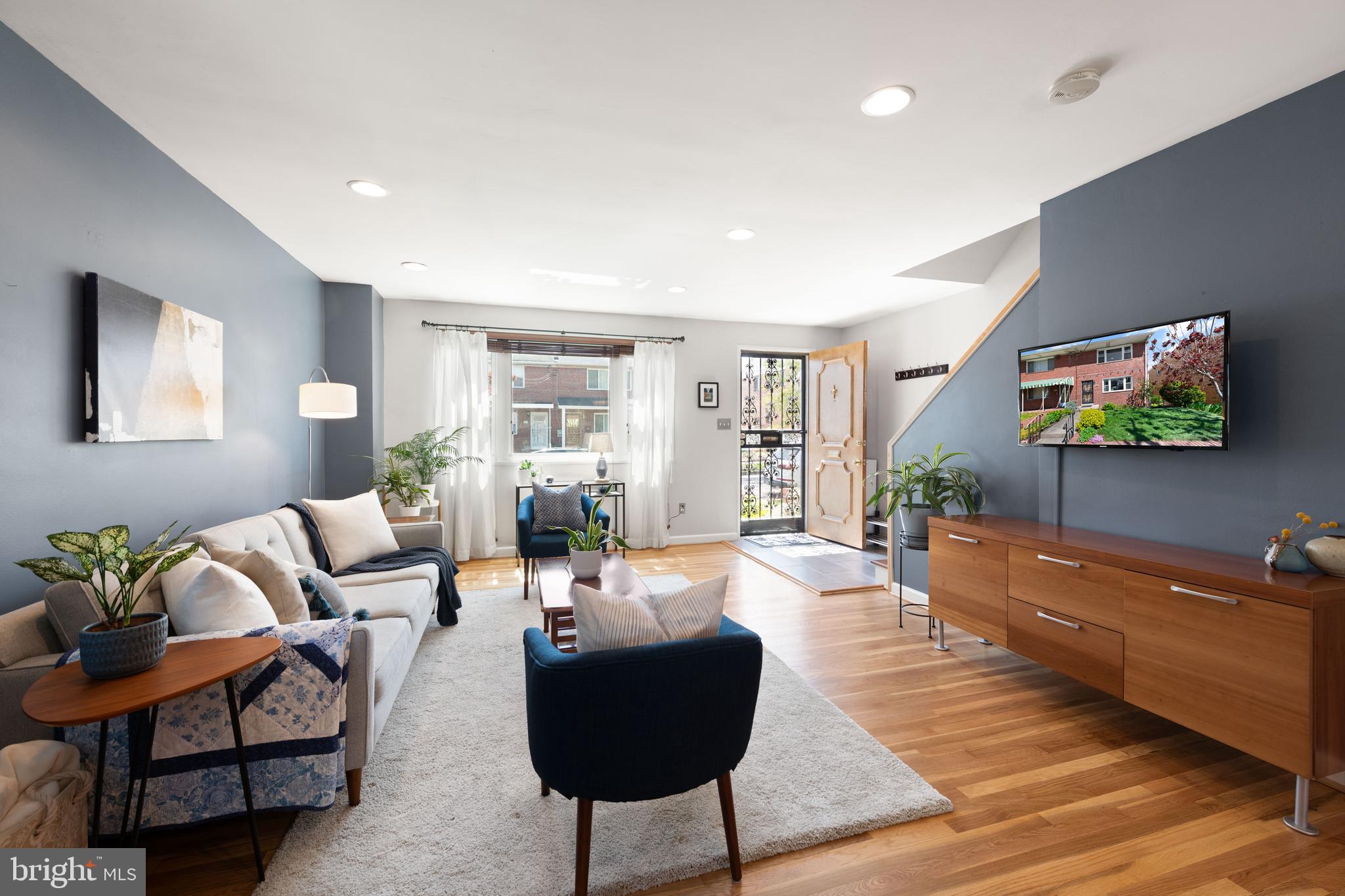 716 Delafield Street Northeast Washington, DC 20017 - Photo 15 of 32 a living room with furniture and a flat screen tv