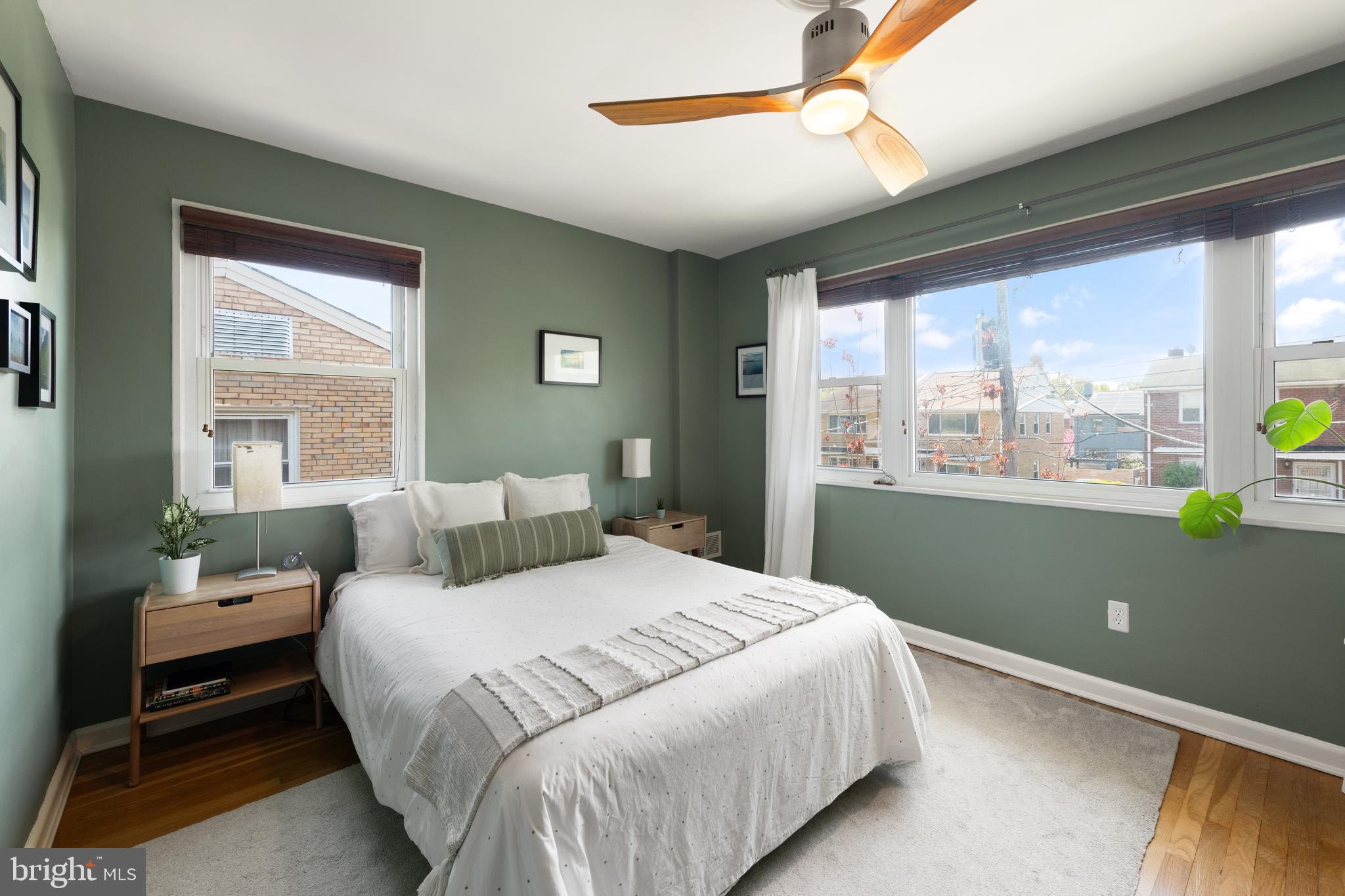 716 Delafield Street Northeast Washington, DC 20017 - Photo 16 of 32 a bedroom with a bed and a window