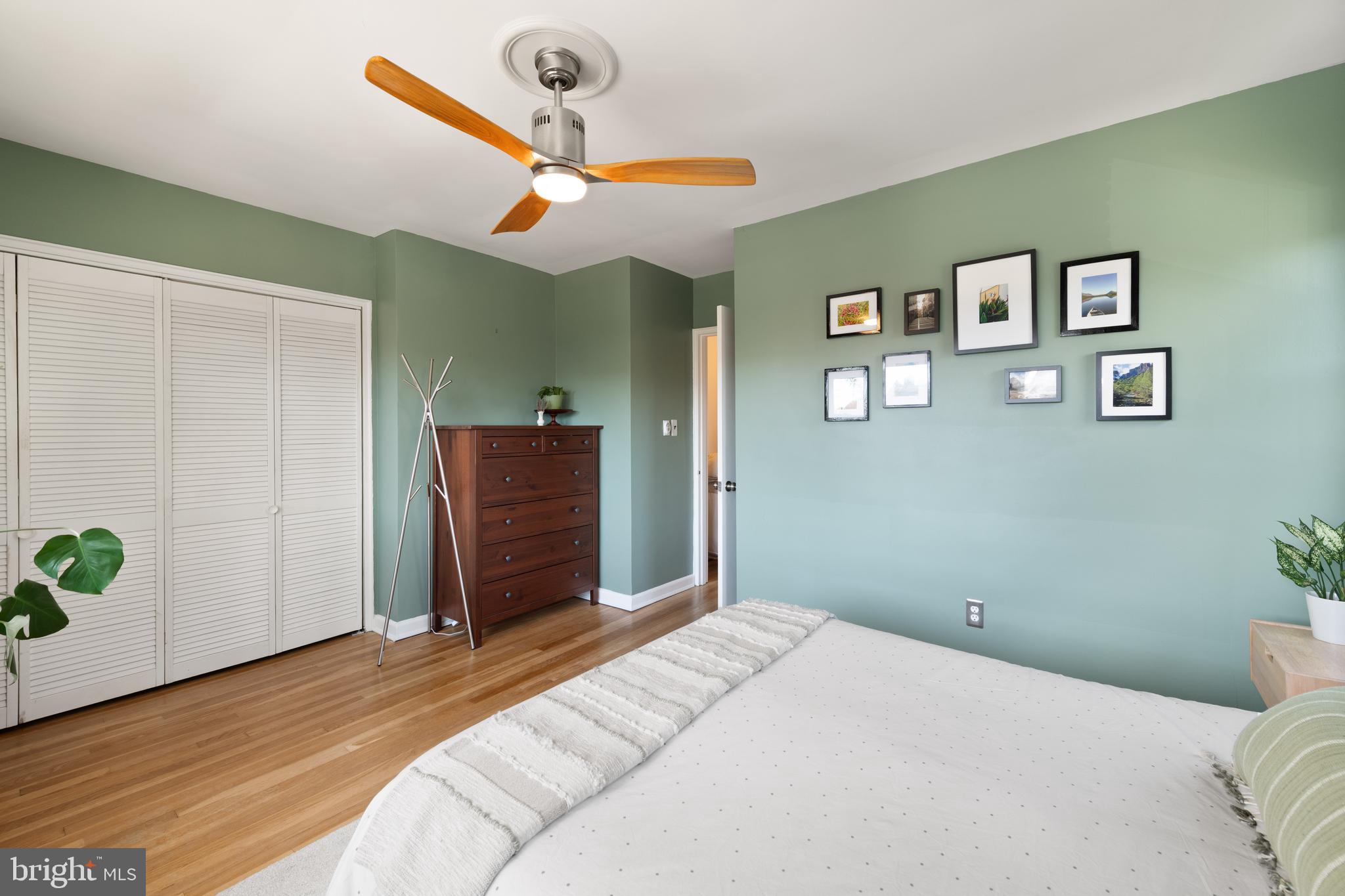 716 Delafield Street Northeast Washington, DC 20017 - Photo 17 of 32 a bedroom with a bed and a dresser