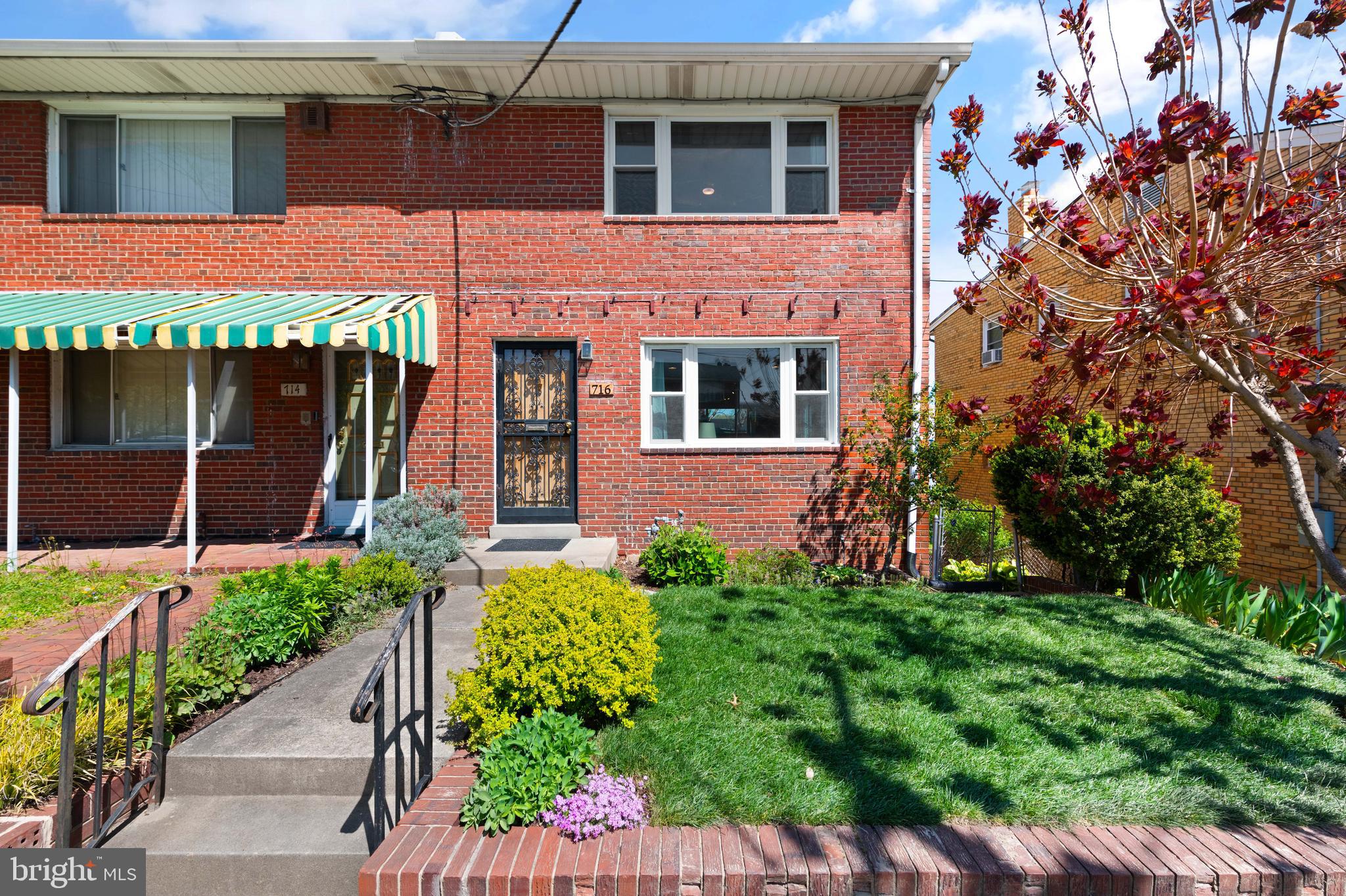 716 Delafield Street Northeast Washington, DC 20017 - Photo 2 of 32 a view of a house with potted plants