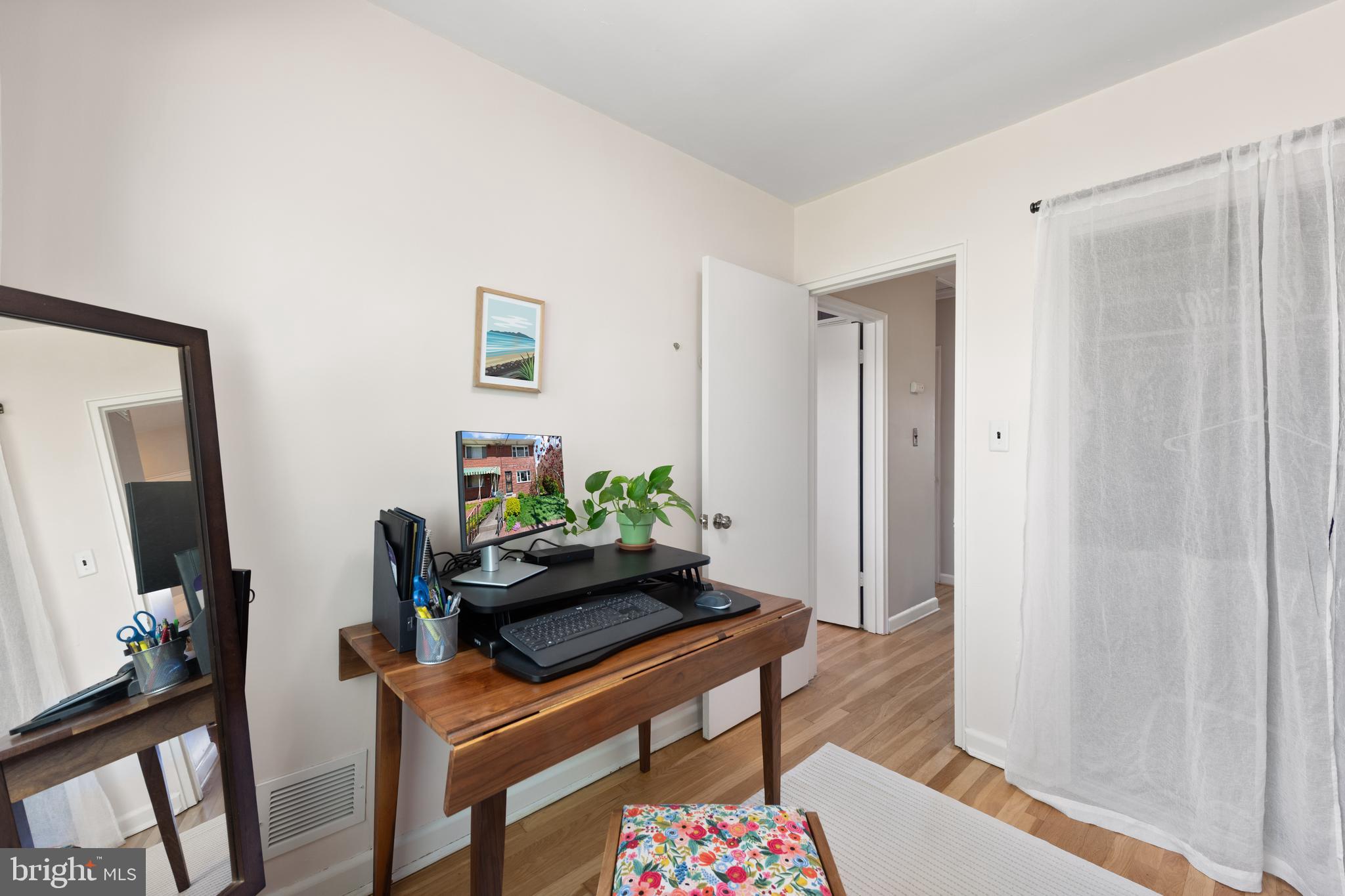 716 Delafield Street Northeast Washington, DC 20017 - Photo 21 of 32 a living room with furniture and a flat screen tv
