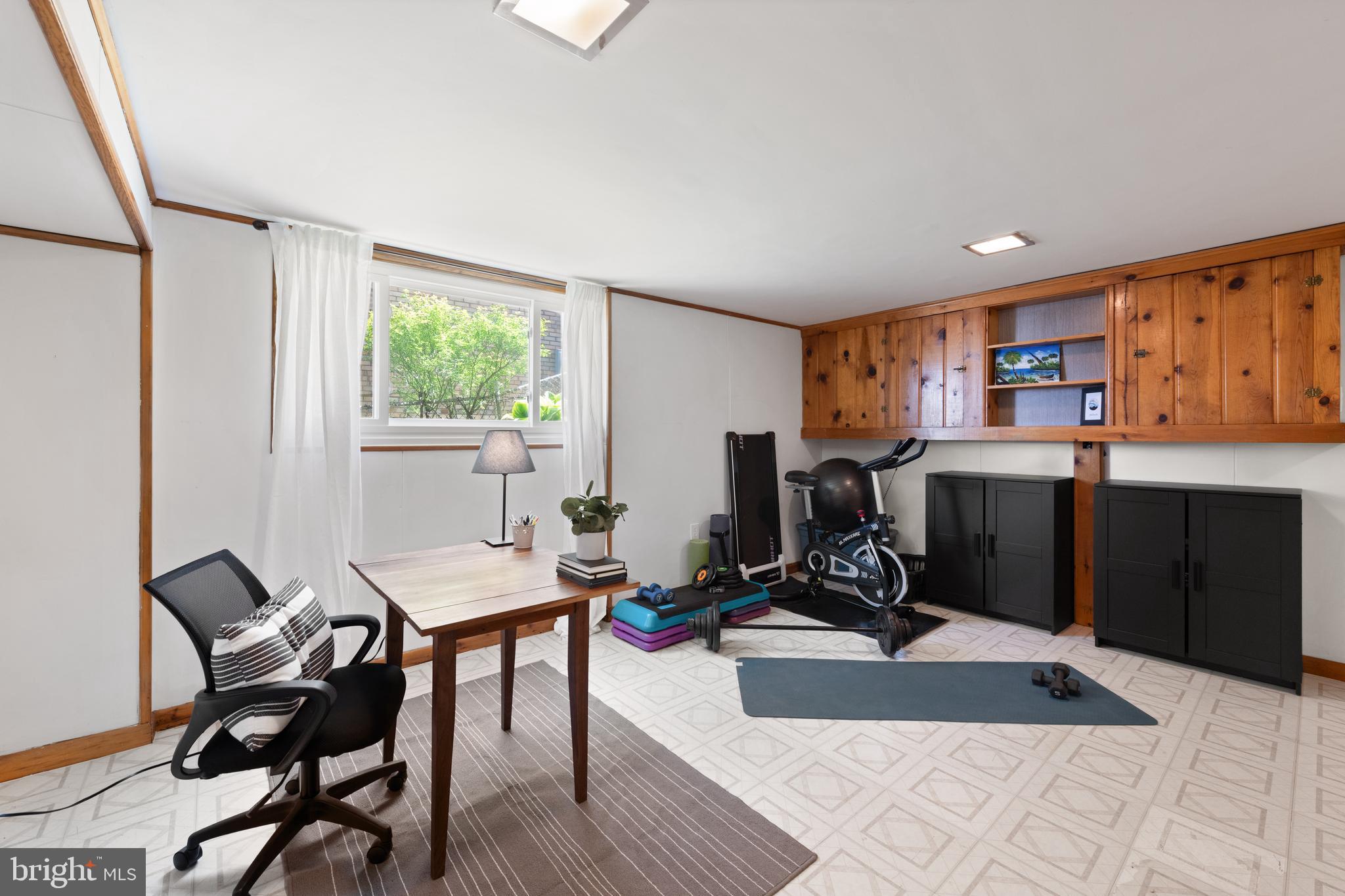 716 Delafield Street Northeast Washington, DC 20017 - Photo 25 of 32 a room with chairs closet and window