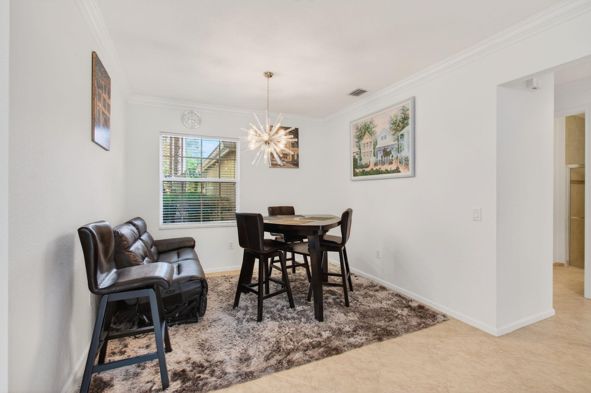 7533 Topiary Avenue Boynton Beach, FL 33437 - Photo 12 of 90 a view of a dining room with furniture
