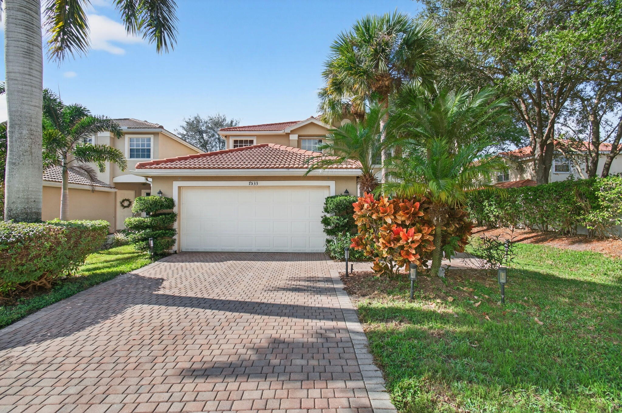 7533 Topiary Avenue Boynton Beach, FL 33437 - Photo 2 of 90 a view of a house with a yard