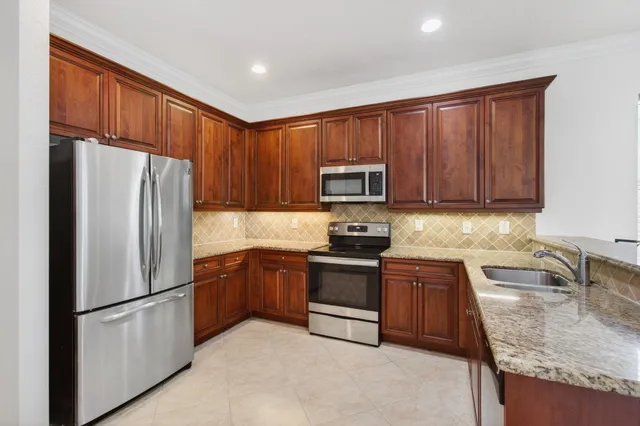 a view of room with hardwood floor and window