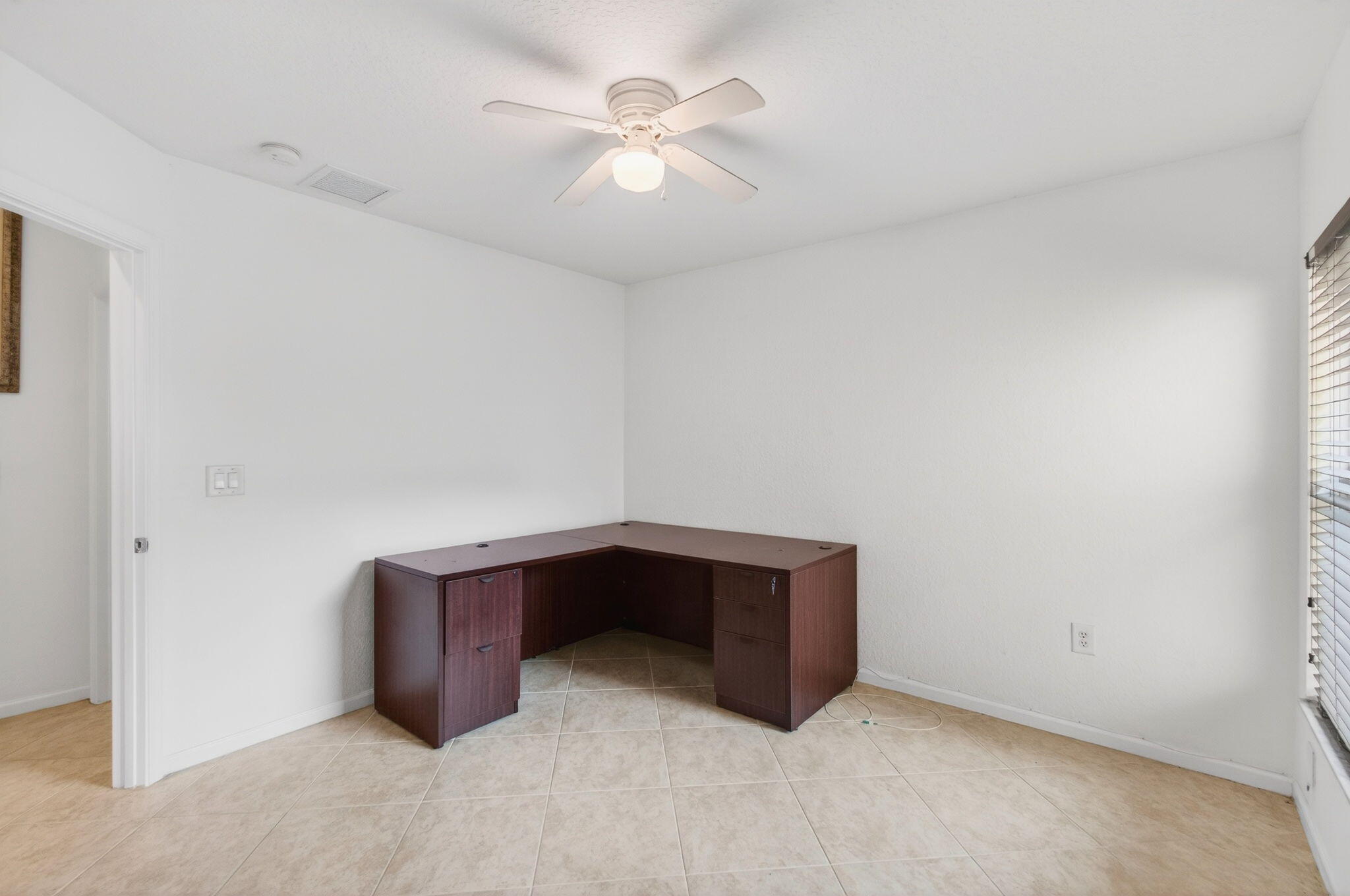 7533 Topiary Avenue Boynton Beach, FL 33437 - Photo 31 of 90 a room with furniture