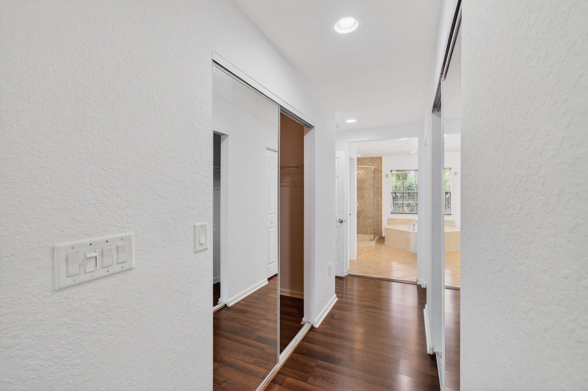 7533 Topiary Avenue Boynton Beach, FL 33437 - Photo 41 of 90 a view of hallway with wooden floor