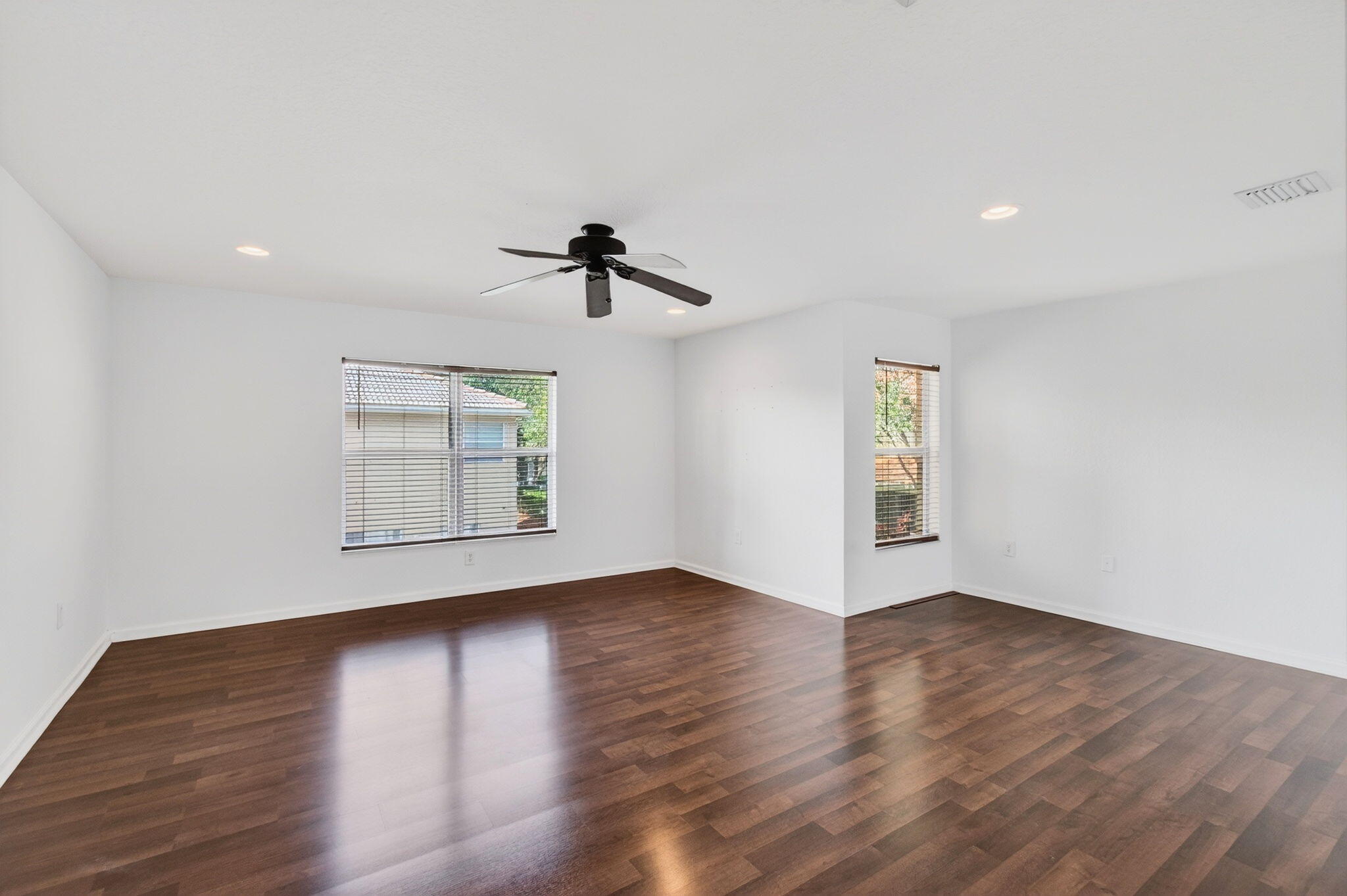 7533 Topiary Avenue Boynton Beach, FL 33437 - Photo 42 of 90 a view of room with hardwood floor and window
