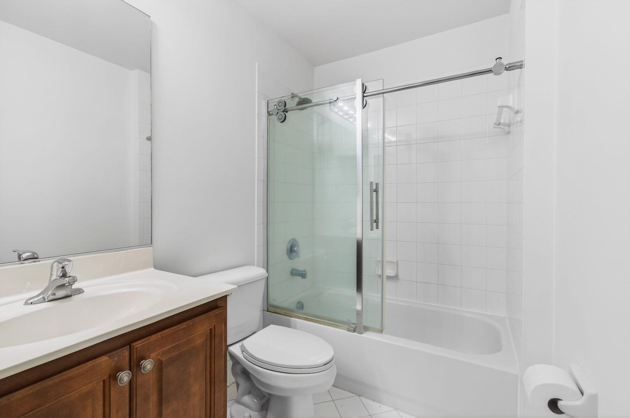 7533 Topiary Avenue Boynton Beach, FL 33437 - Photo 45 of 90 a bathroom with a sink toilet and shower