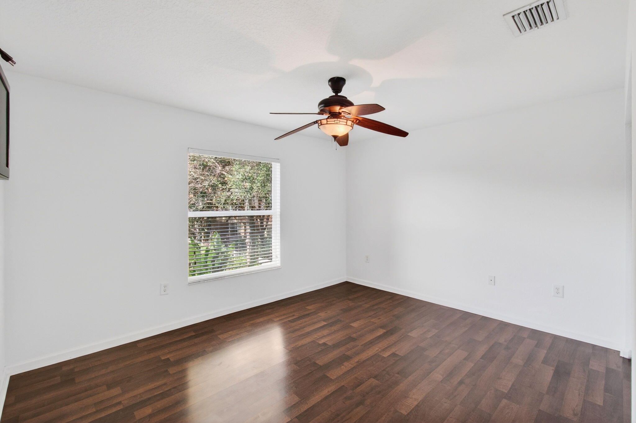 7533 Topiary Avenue Boynton Beach, FL 33437 - Photo 47 of 90 an empty room with a window