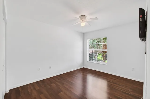 an aerial view of a house with yard swimming pool and outdoor seating