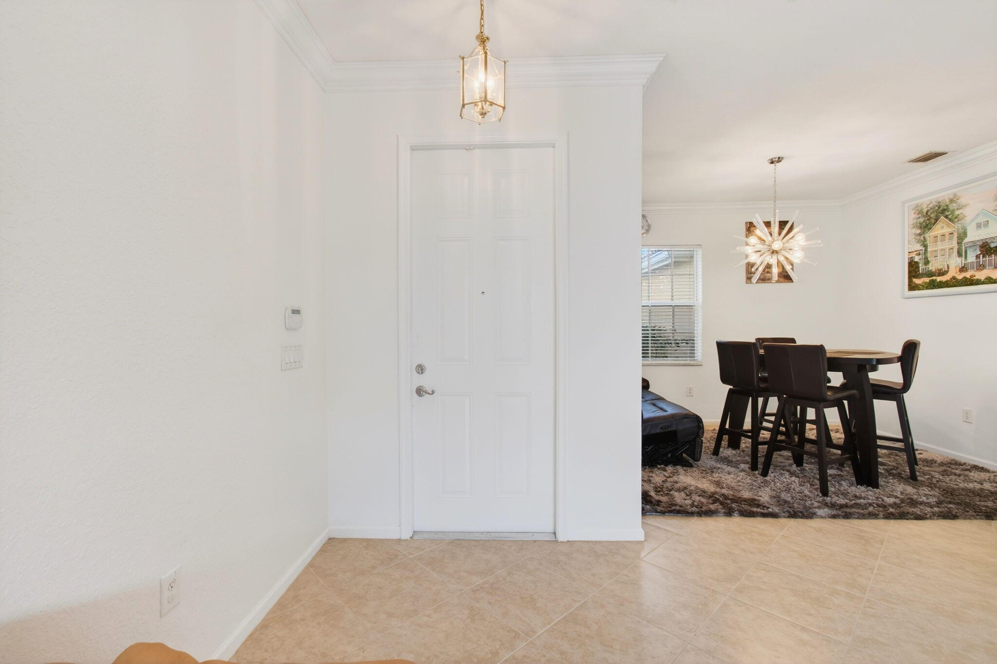 7533 Topiary Avenue Boynton Beach, FL 33437 - Photo 5 of 90 a view of a dining room with furniture