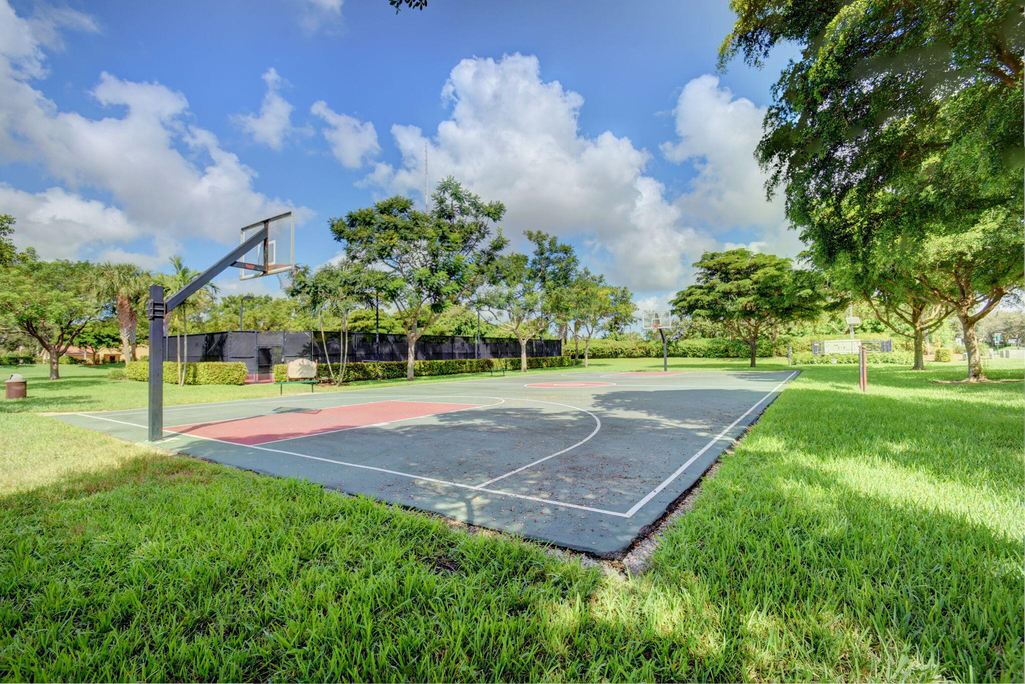 7533 Topiary Avenue Boynton Beach, FL 33437 - Photo 82 of 90 a view of a fountain in front of a house