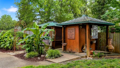 a garden view with a seating space