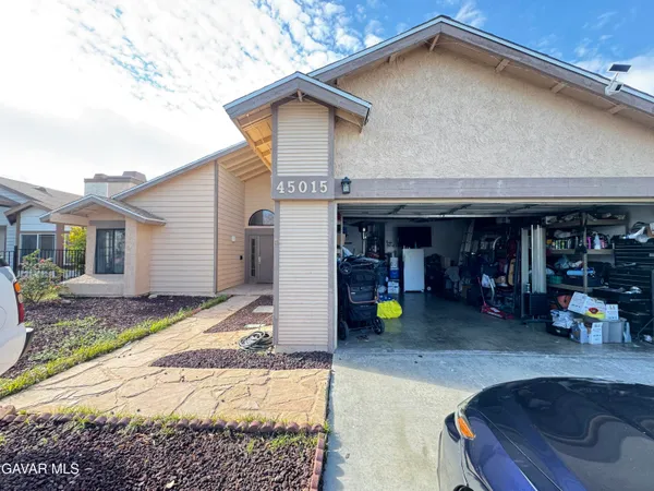 a view of a house with a patio